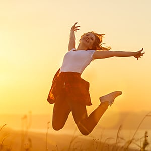 A woman Jumping with job. Iodine provides many health benefits.