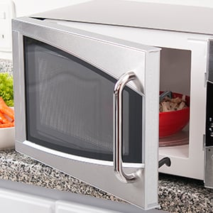 Explore the possible dangers of microwaves, like radiation exposure, effects on food quality, and chemical leakage.