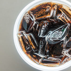 A cup of diet soda, which contains aspartme.