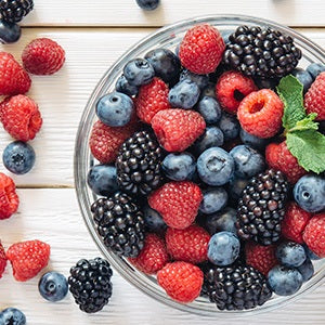 A bowl of berries. The key elements in anti-aging foods are antioxidants.