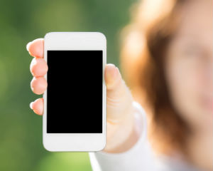 woman-holding-cell-phone