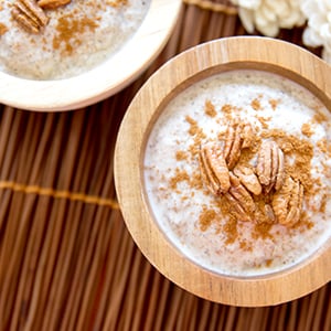 A bowl of coconut cardamom chia seed pudding. The chia seeds in this amazing dessert offer great health benefits.