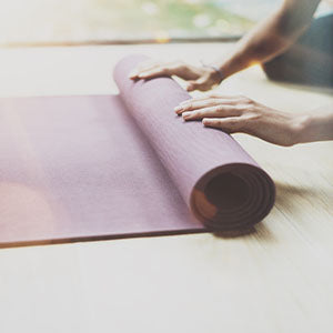 A yoga mat. Did you know yoga is a great exercise to lower back pain?