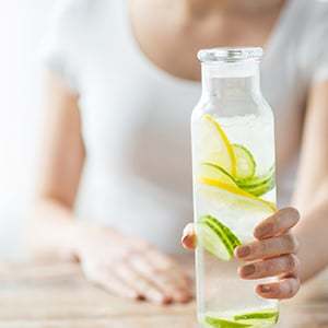 A bottle of lemon water. Fasting diet results may vary depending on the individual.