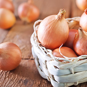 A bucket of onions. Onions can help fight the flu and cold.