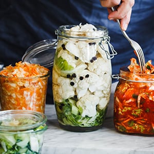 Adding fermented foods like yogurt to your diet is a great way to maintain your gut health.