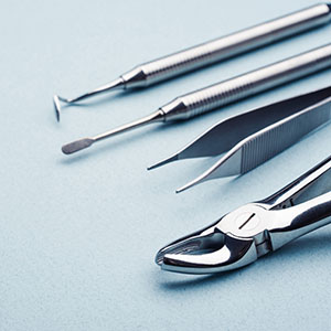 Several dental instruments.