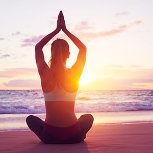 Performing yoga is part of the natural health lifestyle.