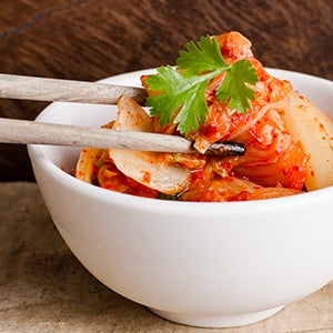 A bowl of Kimchi. Saccharomyces boulardii is a living yeast that supports the gut microflora.