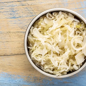 Sauerkraut helps with yeast infections and bacterial vaginosis because it contains probiotics.